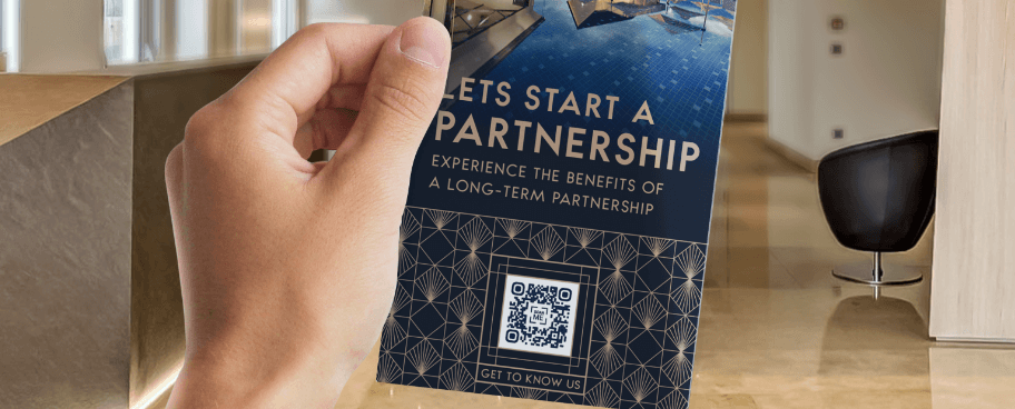 QR Code on a brochure inviting guests to scan in order to access more information.