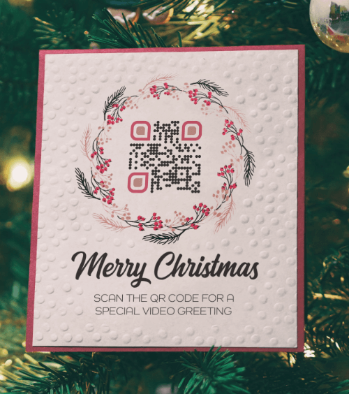 QR Code on a christmas card directing people to a video greeting.